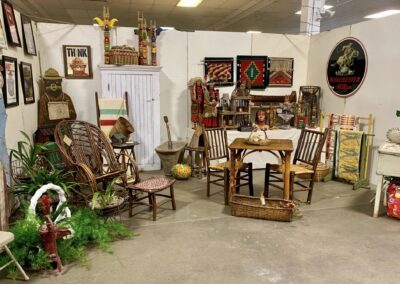Rustic antique furniture and folk art display