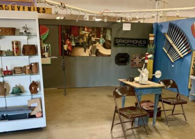 Show floor display with vintage souvenirs and saxophones